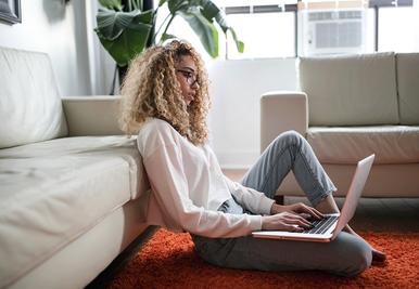 woman communicating on laptop